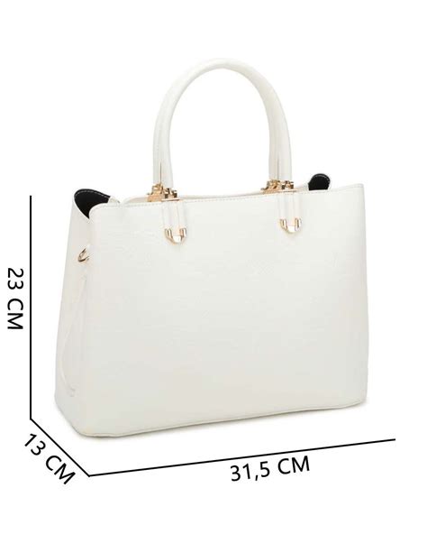 Dettaglio borsa coordinata con accessori interni