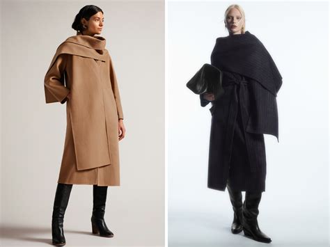 bimbo avvolto in una coperta calda con cappotto e sciarpa